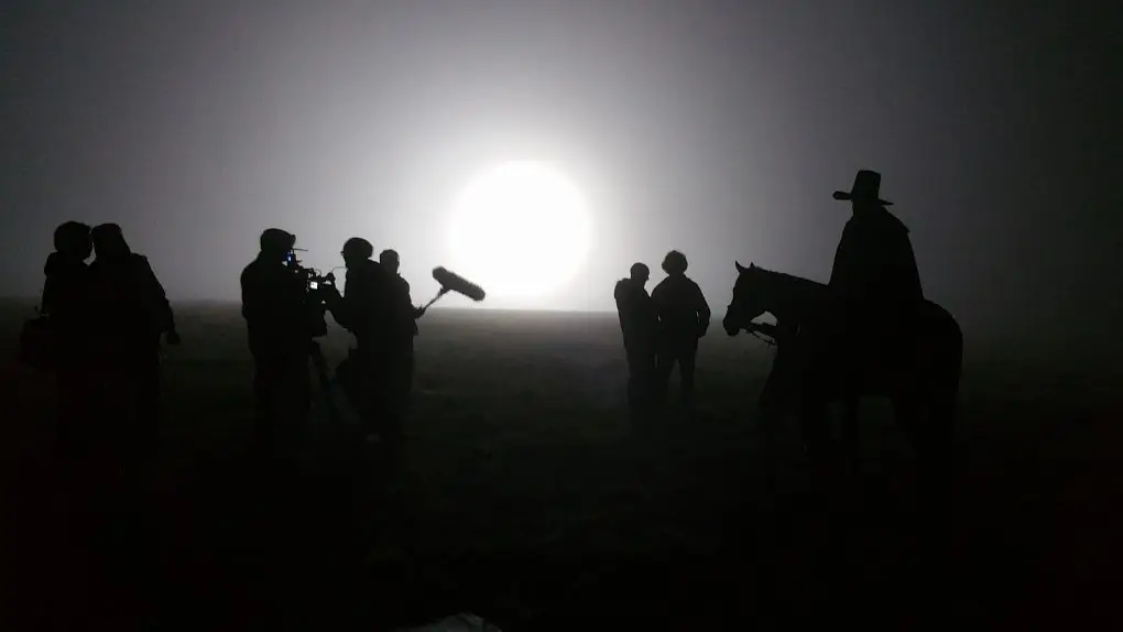 Arri 12kw HMI Cast and crew silhouetted